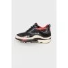 Black sneakers with leather inserts
