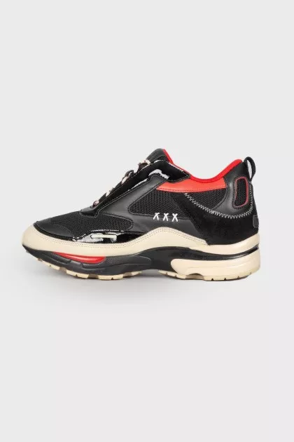 Black sneakers with leather inserts