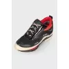Black sneakers with leather inserts