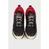Black sneakers with leather inserts