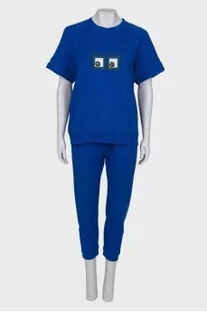 Blue suit with appliqué