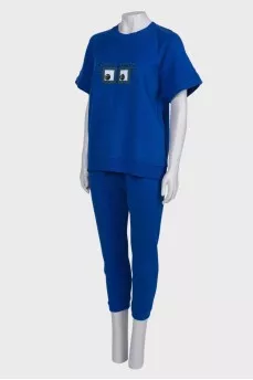 Blue suit with appliqué