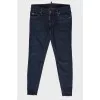 Jeans with rhinestone brooch