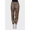 Pants with lurex and print