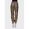 Pants with lurex and print