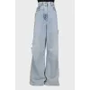 Back embroidered jeans with tag