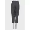 Gray trousers with stripes