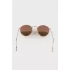Sunglasses with mirrored lenses