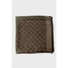 Green scarf with brand logo