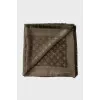 Green scarf with brand logo