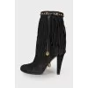 Black suede boots with fringes