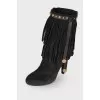 Black suede boots with fringes