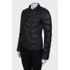 Black jacket with asymmetric closure