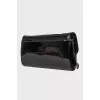 Lacquered clutch bag with chain
