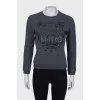 Gray sweatshirt with brand logo