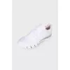 Textile white sneakers, with a tag