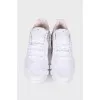 Textile white sneakers, with a tag