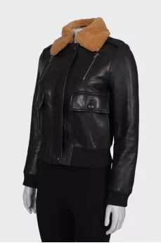 Leather jacket with fur collar