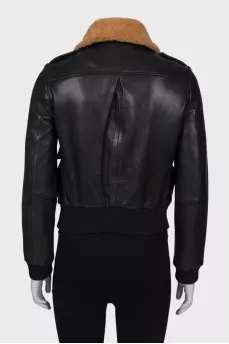 Leather jacket with fur collar