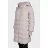 Down jacket with knitted cuffs