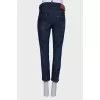 Navy blue jeans with patches