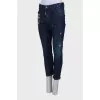 Navy blue jeans with patches