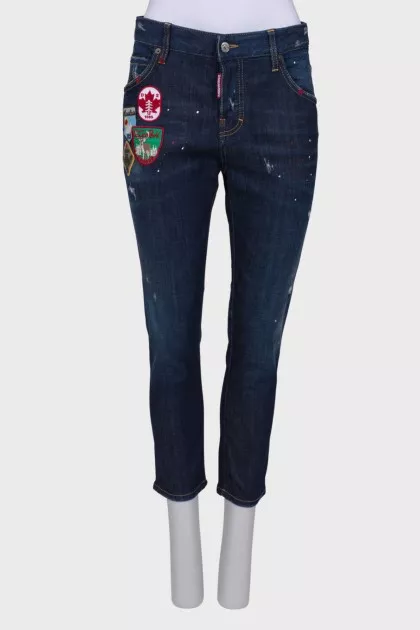Navy blue jeans with patches