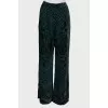 Dark green trousers with velor pattern