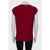 Red sleeveless blouse