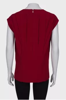Red sleeveless blouse