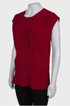 Red sleeveless blouse