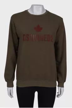 Dark green sweatshirt with brand logo