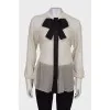 Sheer blouse with a bow