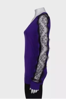 Wool sweater with lace sleeves