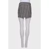Checkered skirt with front slit