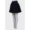 Black skirt with textile pattern