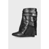 Leather ankle boots with a strap