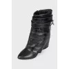 Leather ankle boots with a strap