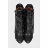 Leather ankle boots with a strap