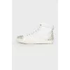 Studded white leather sneakers