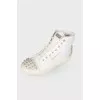 Studded white leather sneakers