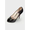 Open toecap patent leather shoes