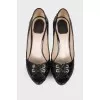 Open toecap patent leather shoes