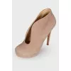 Beige leather slit ankle boots