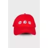 Red cap with embroidery, with a tag