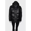 Jacket with a visor on the hood