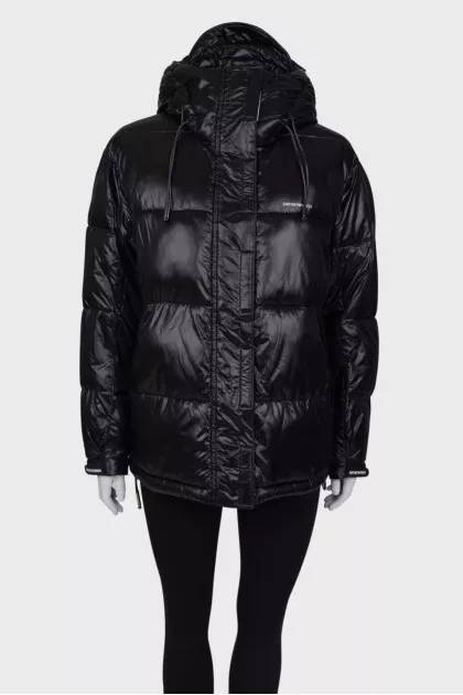 Jacket with a visor on the hood