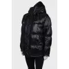 Jacket with a visor on the hood