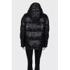Jacket with a visor on the hood