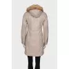 Coat with natural fur on the hood